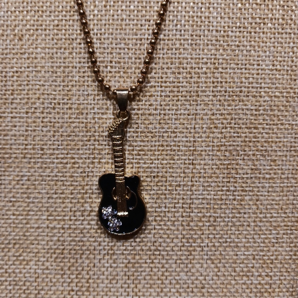 Women's Goldtone and Black Guitar Necklace w/Rhinestone Flower Accents